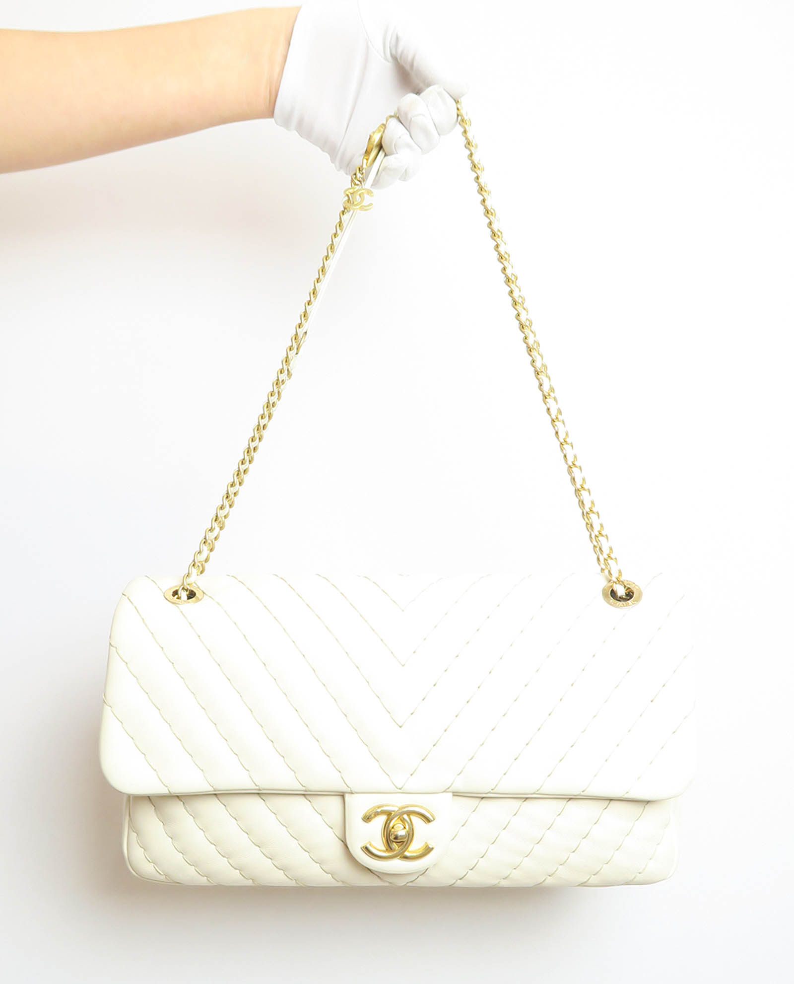 Chanel surpique hot sale flap bag